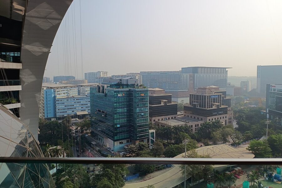 Bank office towers around Jio Garden in Bandra Kurla Complex, Mumbai, where many of the finance and professional-services jobs the World Bank counts as AI-exposed are concentrated (illustrative).