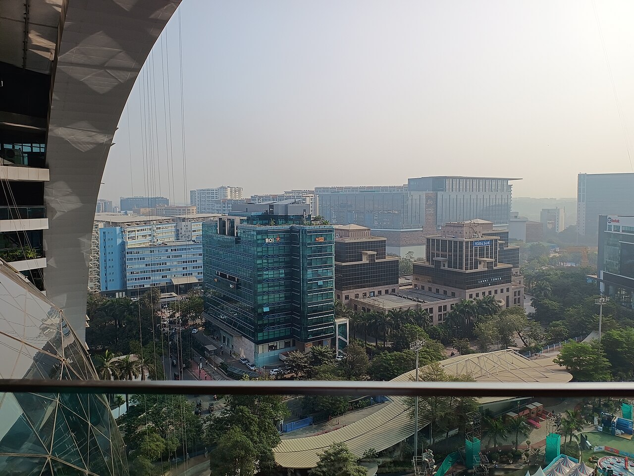 Bank office towers around Jio Garden in Bandra Kurla Complex, Mumbai, where many of the finance and professional-services jobs the World Bank counts as AI-exposed are concentrated (illustrative).
