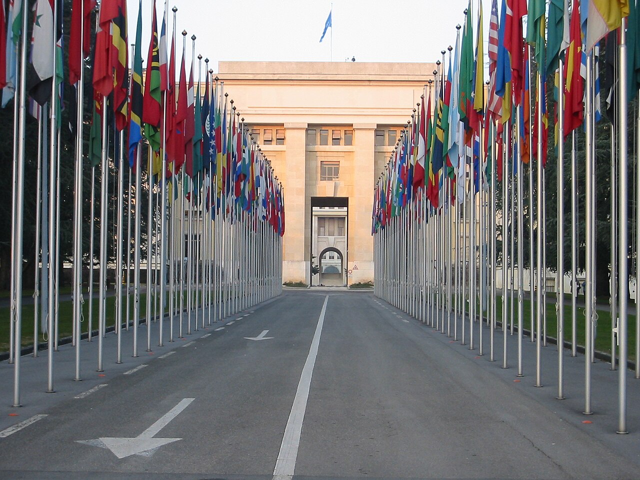 Flags in front of the Palais des Nations, Geneva, where the CCW Review Conference meets.