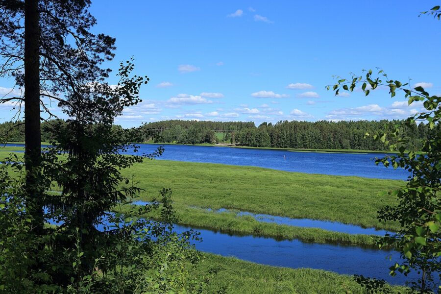 The Oulujoki river at Muhos, northern Finland, the municipality where Google's subsidiary cleared a planned data-centre site (illustrative; photographed in July 2017).