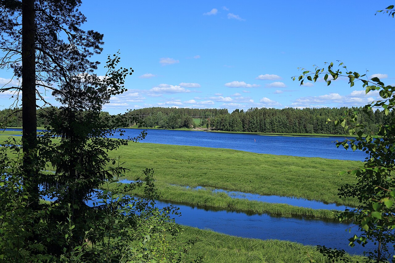 The Oulujoki river at Muhos, northern Finland, the municipality where Google's subsidiary cleared a planned data-centre site (illustrative; photographed in July 2017).
