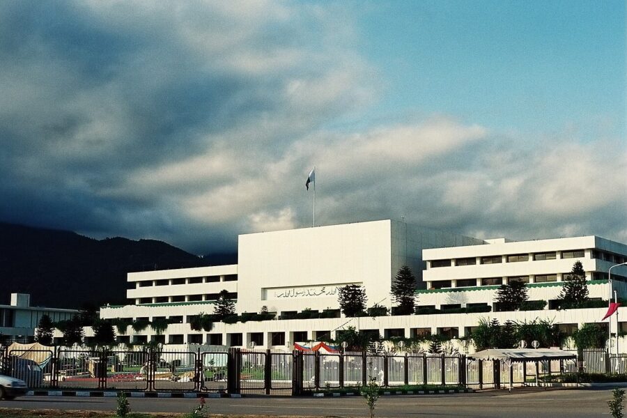 The long colonnaded front of Pakistan's Parliament House in Islamabad, seen from the approach road.