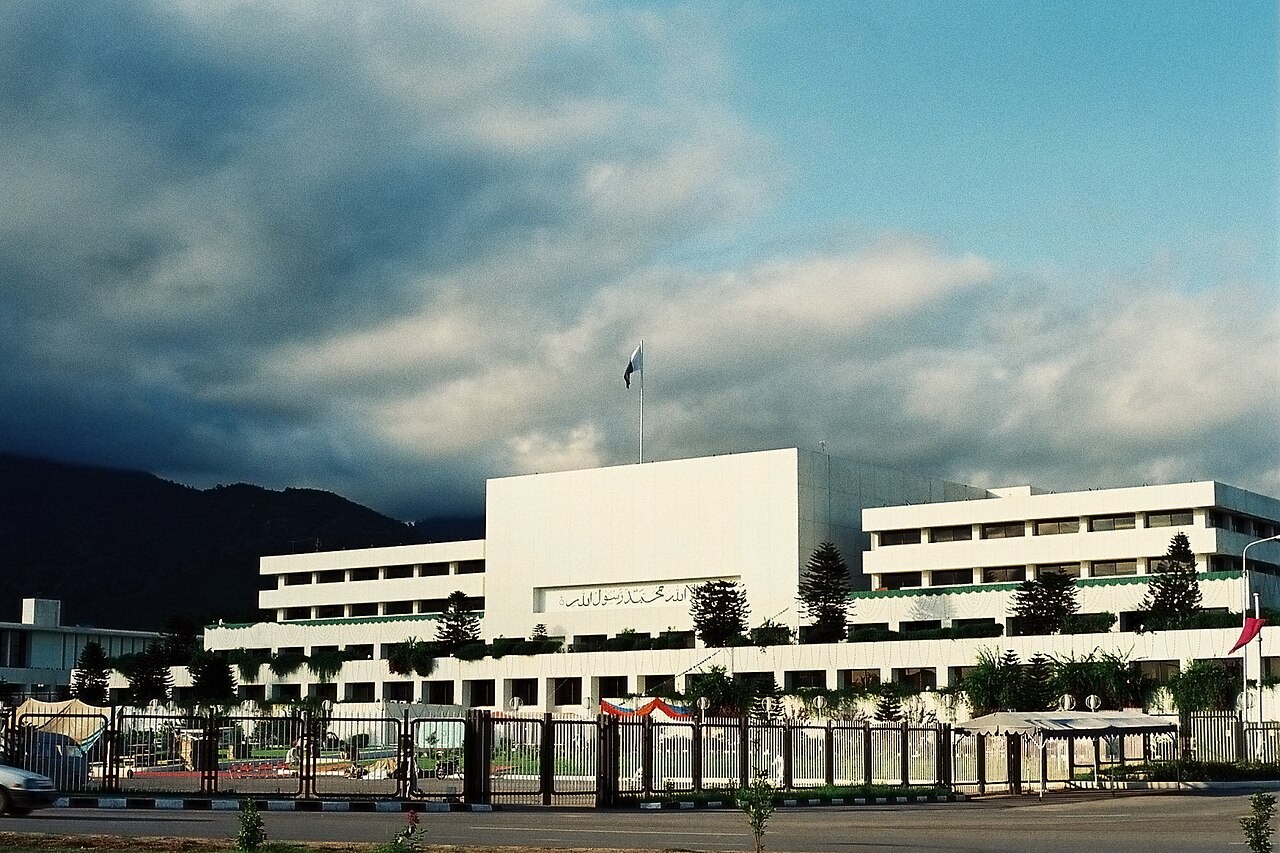 The long colonnaded front of Pakistan's Parliament House in Islamabad, seen from the approach road.