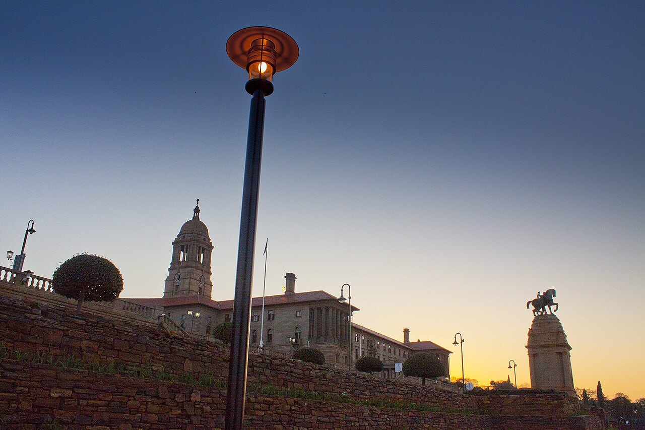 The east wing of the Union Buildings in Pretoria and the Delville Wood memorial in early-morning light